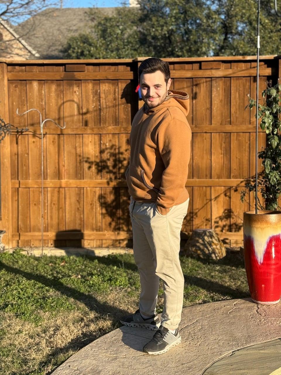 Christopher in a fall outfit outdoors